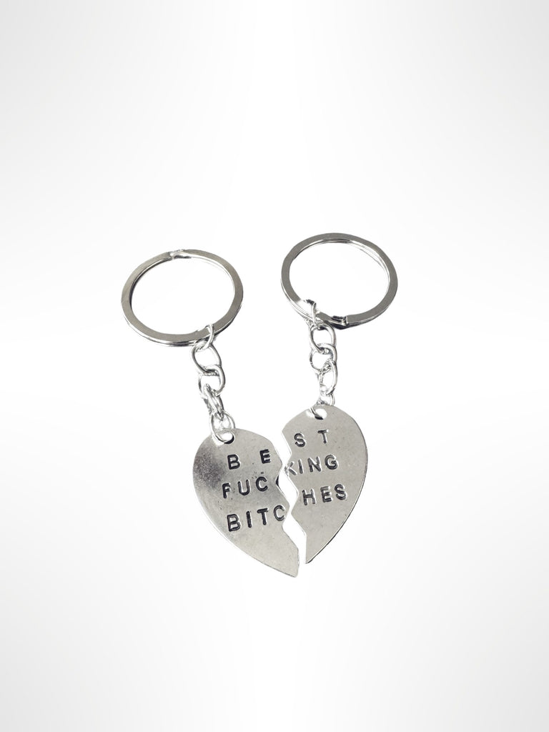 stainless steel broken heart key chain with Best Fucking Bitches stamped on it. One for you and one for your Bestie.